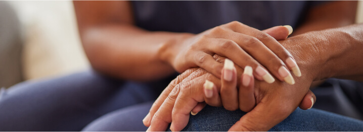 Doctor comforting patient